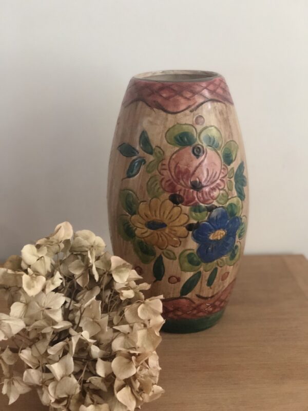 Le joli vase fleuri