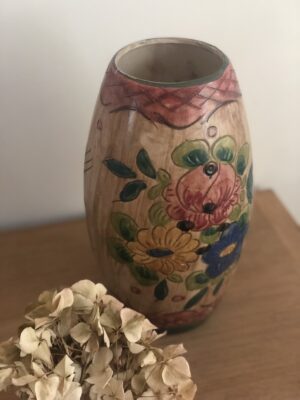 Le joli vase fleuri